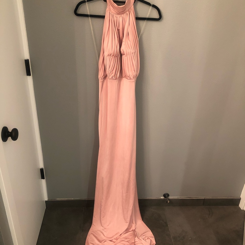 Silk pink backless dress with long train.